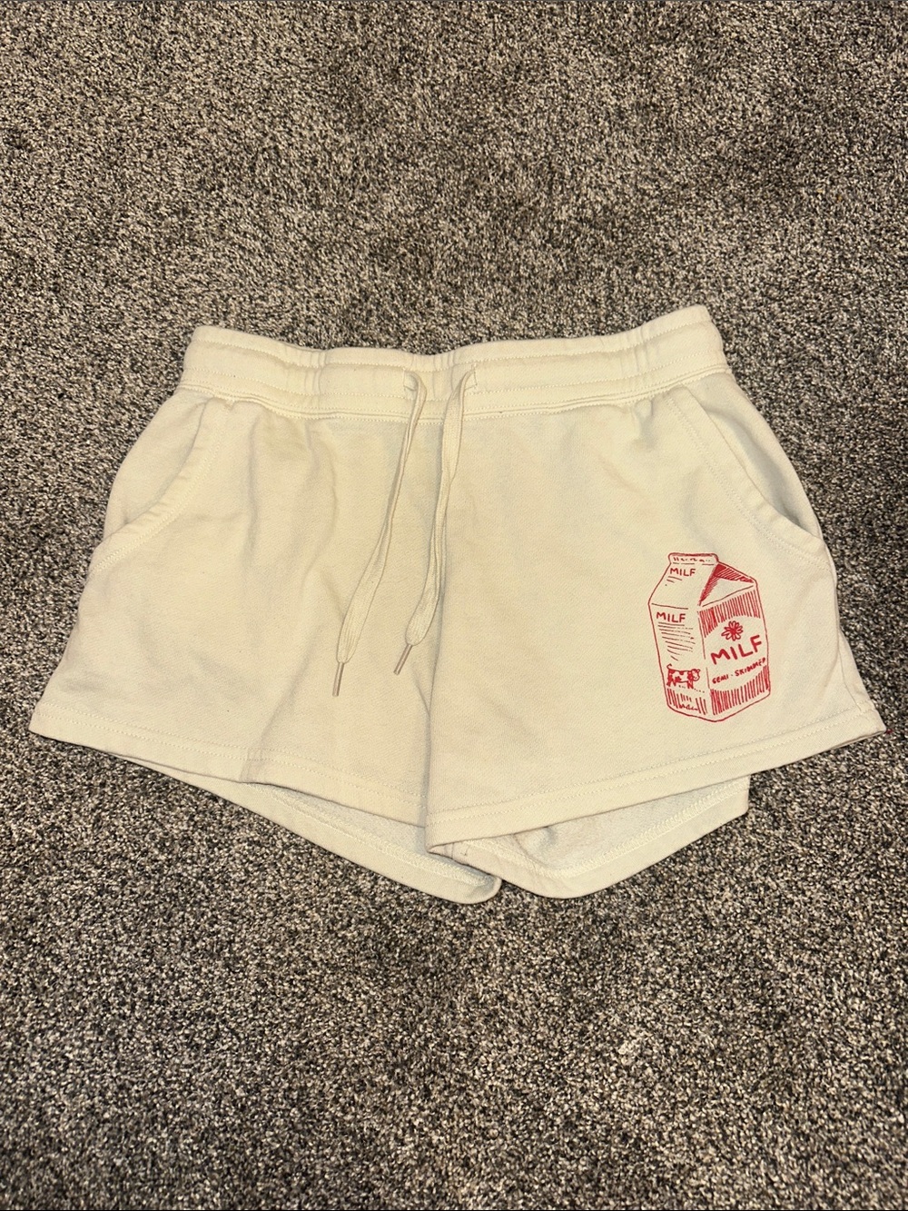 Cream Drawstring Athletic Shorts with Red Graphic